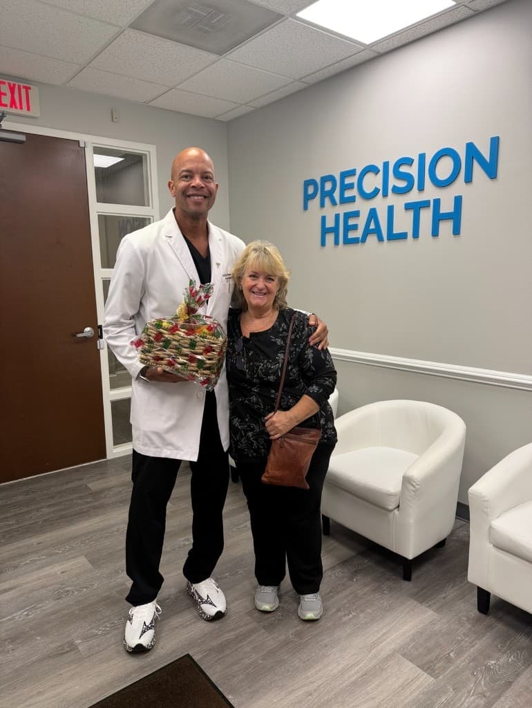 Dr. Brown with patient at Precision Health